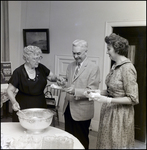 Woman Serving Punch at Community Concert Association Birthday Event, Tampa, Florida by George Skip Gandy IV