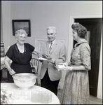 Woman Serving Punch and Smiling at Community Concert Association Birthday Event, Tampa, Florida by George Skip Gandy IV