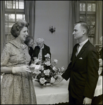 Man and Woman Talking at Community Concert Association Birthday Event, Tampa, Florida, A by George Skip Gandy IV