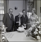 Mrs. L.P. Geer Looking Down and Cutting a Cake at the Community Concert Association Birthday Event, Tampa, Florida by George Skip Gandy IV