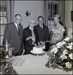 Mrs. L.P. Geer Cutting Cake at Community Concert Association Birthday Event, Tampa, Florida, B by George Skip Gandy IV