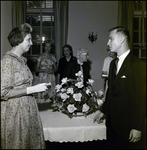 Man and Woman Talking at Community Concert Association Birthday Event While People Observe, Tampa, Florida by George Skip Gandy IV