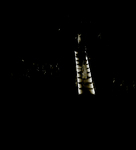 Woman Walking Down Lit Runway, Tampa, Florida by George Skip Gandy IV