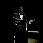 Gary Merrill Reading from Book on Stage, Tampa, Florida, C by George Skip Gandy IV