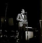 Gary Merrill Speaking into Microphone on Stage, Tampa, Florida by George Skip Gandy IV