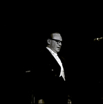 Jack Benny Standing in Front of Microphone Onstage, Tampa, Florida by George Skip Gandy IV