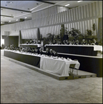 People Sitting at Banquet Tables On a Stage, Tampa, Florida, A by George Skip Gandy IV