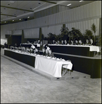 People Sitting at Banquet Tables On a Stage, Tampa, Florida, C by George Skip Gandy IV