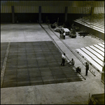 People Constructing Ice Rink in Curtis Hixon Hall, Tampa, Florida, A by George Skip Gandy IV