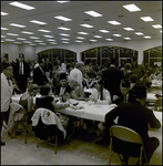 People Sitting at Banquet Tables and Talking, Tampa, Florida by George Skip Gandy IV