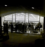 People Sitting and Standing in Convention Hall, Tampa, Florida, A by George Skip Gandy IV