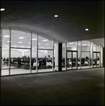 People Sitting at Long Banquet Tables as Seen Through a Window, Tampa, Florida by George Skip Gandy IV