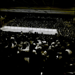 Large Crowd Surrounding Dimly Lit Ice Rink, Tampa, Florida, A by George Skip Gandy IV