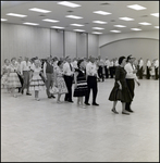 Couples Walking in a Line, Tampa, Florida, A by George Skip Gandy IV