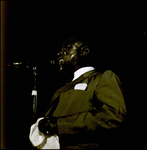 Louis Armstrong Speaking into Microphone and Holding a Rag, Tampa, Florida, C by George Skip Gandy IV