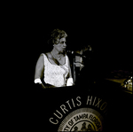 Woman Speaking at Podium, Tampa, Florida by George Skip Gandy IV