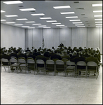 Sitting Crowd Watching Man Speak at Podium, Tampa, Florida, B by George Skip Gandy IV