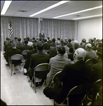 Sitting Crowd Watching Man Speak at Podium, Tampa, Florida, D by George Skip Gandy IV