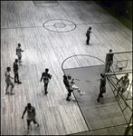 Harlem Globetrotter Lifting Washington General Off Basketball Court, Tampa, Florida by George Skip Gandy IV