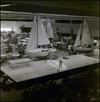 Man on Stage at the First Annual Greater Tampa Boat and Sportsman's Show, Tampa, Florida, A by George Skip Gandy IV