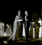 Man Speaking into Microphone Next to Nadine Williams, Tampa, Florida by George Skip Gandy IV