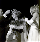 Man Placing Crown on Nadine Williams Head, Tampa, Florida by George Skip Gandy IV