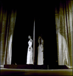 Two Miss Tampa Contestants Standing Back to Back Onstage, Tampa, Florida by George Skip Gandy IV