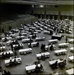 People Sitting at Banquet Tables in Auditorium, Tampa, Florida by George Skip Gandy IV