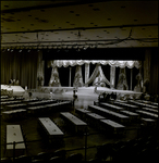 Banquet Tables Set Up in Front of Decorated Stage, Tampa, Florida, A by George Skip Gandy IV