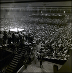 Sitting and Standing Crowd Surrounding Boxing Ring, Tampa, Florida, A by George Skip Gandy IV