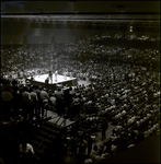 Sitting and Standing Crowd Surrounding Boxing Ring, Tampa, Florida, C by George Skip Gandy IV