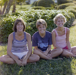 Three Women Sitting on Grass, Tampa, Florida, A by George Skip Gandy IV