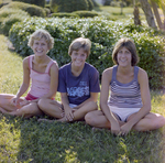 Three Women Sitting on Grass, Tampa, Florida, B by George Skip Gandy IV