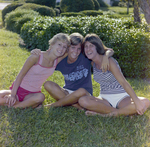 Three Women Sitting on Grass, Tampa, Florida, F by George Skip Gandy IV