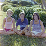 Three Women Sitting on Grass, Tampa, Florida, K by George Skip Gandy IV