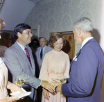 Governor Bob Graham Shakes a Man's Hand while Rosalynn Carter Looks On by George Skip Gandy IV