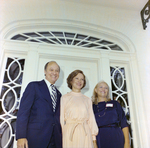 Rosalynn Carter Poses with a Couple Outside in Front of a House, B by George Skip Gandy IV