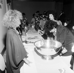 Partygoers, Some in Costume, Enter a Raffle by George Skip Gandy IV