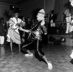 A Man Dressed as a Conehead Dances the Limbo by George Skip Gandy IV