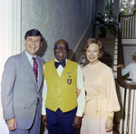 Rosalynn Carter and Bob Graham Pose with a Representive in a Yellow Vest, B by George Skip Gandy IV