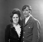 Darlene Castle Poses with Chuck Burns, L by George Skip Gandy IV