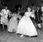 Miss Florida and Miss Iowa Dance the Limbo by George Skip Gandy IV