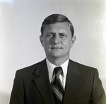 Male Employee With Striped Suit at Cook Quik, Inc., T by George Skip Gandy IV