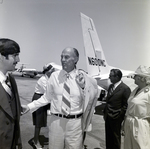 Jack Eckerd and Group Walks Away from Plane, Palm Beach County, Florida, A by George Skip Gandy IV