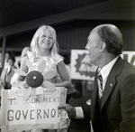 Jack Eckerd with Child Holding Birthday Sign, A by George Skip Gandy IV