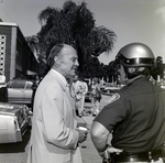 Jack Eckerd Speaks with a Police Officer by George Skip Gandy IV