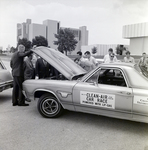 John S. Allen and Engineering Students Examine Clean Air Race Vehicle, E by George Skip Gandy IV