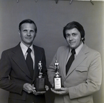 Kenneth Monska and Edward Halvorsen Holds Distinguished Salesman Trophy, B by George Skip Gandy IV