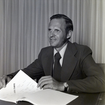 Portrait of Edward Halvorsen at Desk, Viewing Report, B by George Skip Gandy IV