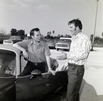 Two Individuals Speak in Parking Lot, Del Monte Corperation, Public Affairs Dept, B by George Skip Gandy IV